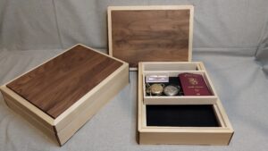 Keepsakeboxes with a sliding tray